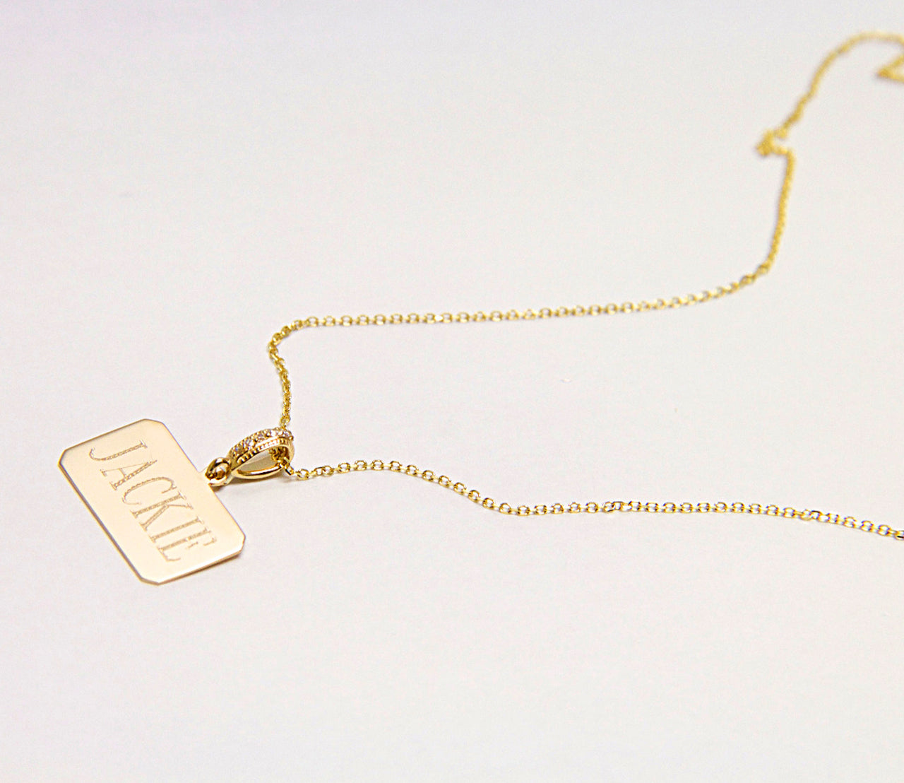 14K Gold Name Tag With Diamond Bale